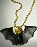 BAT WITH RED RHINESTONES