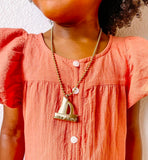 GOLD SAILBOAT CHARM NECKLACE